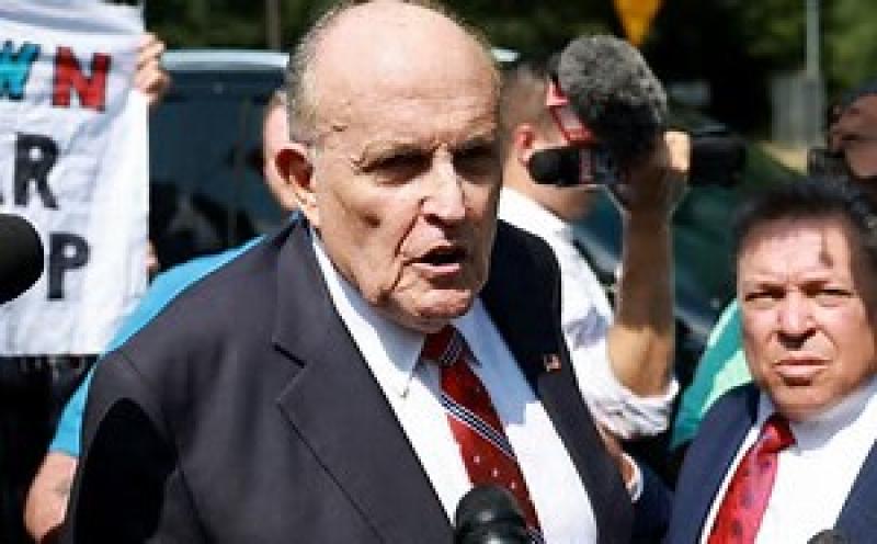UKRAINE INDICTS GIULIANI PALS AS RUSSIAN SPIES
