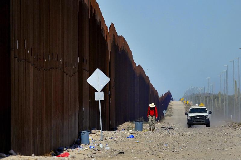 US closes border crossing to vehicles and limits traffic at another in response to illegal entries | AP News