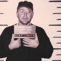 Kamala Harris' running mate Tim Walz pictured in 1995 Nebraska mugshot after DUI arrest