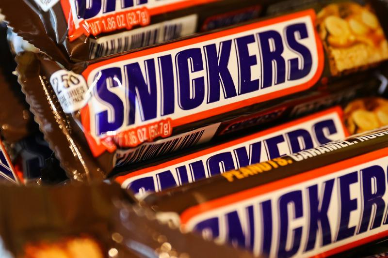 Making a Snickers bar is a complex science − a candy engineer explains how to build the airy nougat and chewy caramel of this Halloween favorite