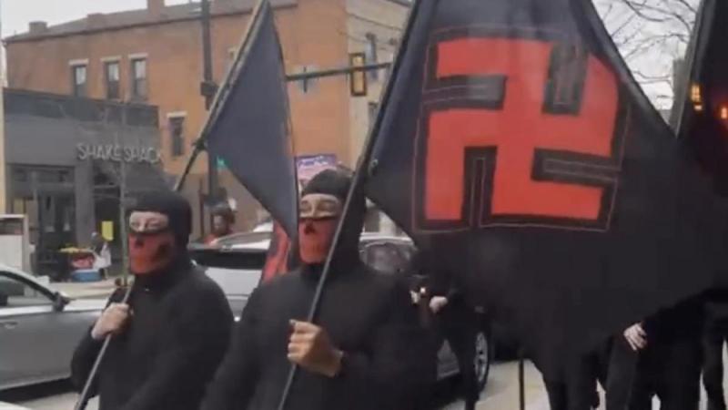 Masked group marches through Ohio neighborhood with swastika flags