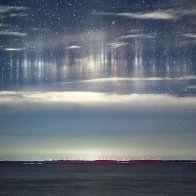 Otherworldly light pillars captured over Whitefish Bay