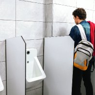 Flushing public urinals can spread COVID-19, study finds